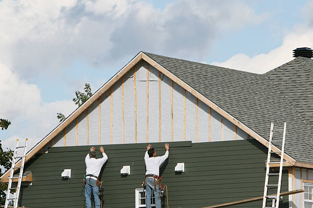 Professional Siding Contractor technician working in Greensboro, MD